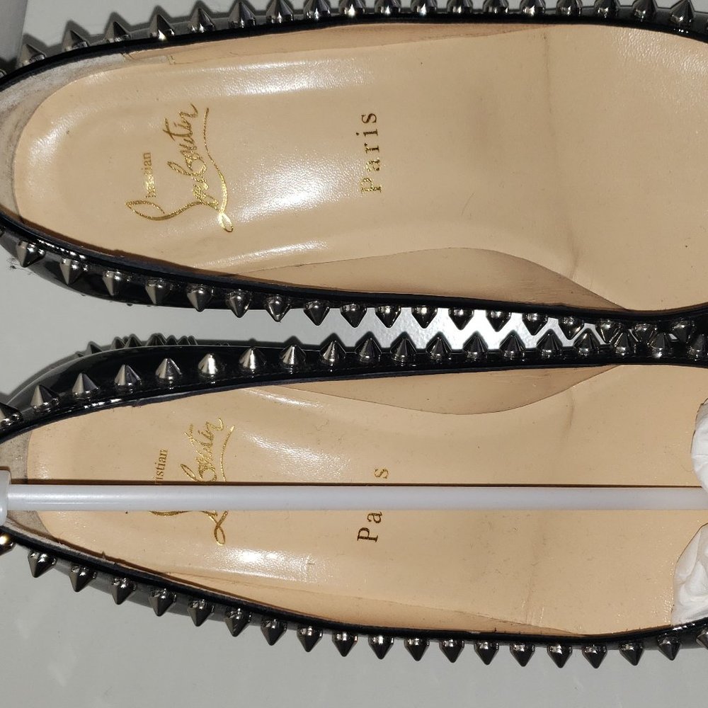 Rare Christian Louboutin flats w/ spikes